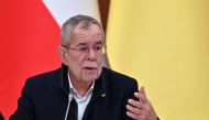 Austrian President Alexander Van der Bellen gestures during a joint press conference with his Ukrainian counterpart following their talks in Kyiv on February 1, 2023. (Photo by Sergei Supinsky / AFP)