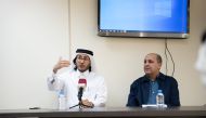 Qatar Boxing Federation (QBF) President Sheikh Fahad bin Khaled Al Thani speaks to reporters during a press conference. QBF Technical Director Salim Lazraq is also present.   