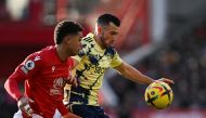Nottingham Forest's Welsh striker Brennan Johnson (left) fights for the ball with Leeds United's English midfielder Jack Harrison during the English Premier League match between Nottingham Forest and Leeds United at The City Ground in Nottingham, central England, on February 5, 2023. (Photo by Paul ELLIS / AFP) 