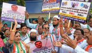 India's Congress party activists take part in a nationwide protest in Mumbai on February 6, 2023, calling for an inquiry into allegations of major accounting fraud at Adani, the country's biggest conglomerate. (Photo by Sujit JAISWAL / AFP)