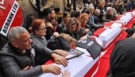 Mourners attend the funeral of seven Cypriot students killed in a powerful earthquake that hit Turkey, on February 10, 2023. (Credit: Birol Bebek/AFP)

