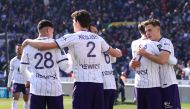 Toulouse's Dutch forward Thijs Dallinga (right) celebrates with teammates after scoring the third goal during the French L1 match between Toulouse FC and Stade Rennais FC at The TFC Stadium in Toulouse, southwestern France, on February 12, 2023. (Photo by Charly TRIBALLEAU / AFP)