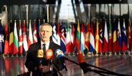 NATO Secretary General Jens Stoltenberg speaks to the press as he arrives for a two-day meeting of the alliance's Defence Ministers at the NATO headquarters in Brussels on February 14, 2023. (Photo by Kenzo TRIBOUILLARD / AFP)