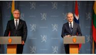 Norwegian Prime Minister Jonas Gahr Stoere (right) and Lithuanian President Gitanas Nauseda address a press conference after their meeting at the prime minister's residence in Oslo on February 13, 2023. (Photo by Annika Byrde / NTB / AFP) / Norway OUT