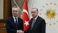 A photograph taken and released by the Turkish Presidential Press Office on February 16, 2023 shows Turkey's President Recep Tayyip Erdogan shaking hands with NATO Secretary General Jens Stoltenberg (L) in Ankara. (Photo by HANDOUT / TURKISH PRESIDENTIAL PRESS SERVICE / AFP)