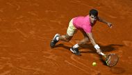 Spain's tennis player Carlos Alcaraz returns the ball to Serbia's tennis player Laslo Djere during their ATP 250 Argentina Open round of 16 tennis game in Buenos Aires on February 15, 2023. (Photo by Luis ROBAYO / AFP)