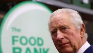 Britain's King Charles III visits the Milton Keynes food bank in Milton Keynes, north of London on February 16, 2023, to see the support they provide to communities across the city. (Photo by Molly Darlington / AFP)