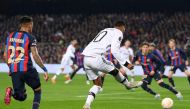 Rashford kicks the ball before Barcelona's French defender Jules Kounde scores an own goal during the UEFA Europa League round of 32 first-leg football match between FC Barcelona and Manchester United at the Camp Nou stadium in Barcelona, on February 16, 2023. (Photo by Josep LAGO / AFP)