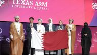 The members of the Texas A&M University at Qatar team with dignitaries following their victory.