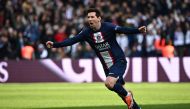 Paris Saint-Germain's Argentine forward Lionel Messi scored a 95th-minute free-kick to give PSG a 4-3 win over Lille LOSC at Ligue 1 match, The Parc des Princes Stadium in Paris on February 19, 2023. (Photo by ANNE-CHRISTINE POUJOULAT / AFP)
