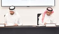 QU President Dr. Hassan Rashid Al Derham (right) and MEEZA CEO Eng. Ahmed Al Muslemani signing the MoU.
