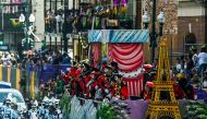 People participate in the 2023 Krewe of Okeanos parade during Mardi Gras in New Orleans, Louisiana, on February 19, 2022. (Photo by CHANDAN KHANNA / AFP)