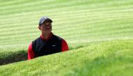 Tiger Woods of the United States reacts to his shot out of a bunker on the 17th hole during the final round of the The Genesis Invitational at Riviera Country Club on February 19, 2023 in Pacific Palisades, California. (Harry How/Getty Images/AFP)