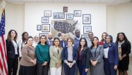 US Assistant Secretary of State for Consular Affairs Rena Bitter (centre) with US Embassy Doha Consular Section staff.