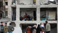 A building damaged by the 7.8-magnitude quake in Aleppo city's al-Masharqa neighbourhood, on February 21, 2023. (Photo by LOUAI BESHARA / AFP)