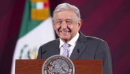 Handout picture released by the Mexican Presidency showing Mexican President Andres Manuel Lopez Obrador smiling during a press conference in Mexico City, on February 22, 2023. (Photo by Mexican Presidency / AFP) /