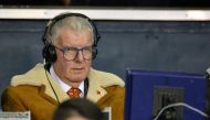 (FILES) In this file photo taken on November 2, 2015 BBC commenatator John Motson watches the English Premier League football match between Tottenham Hotspur and Aston Villa at White Hart Lane in north London. - Football commentator John Motson has died at the age of 77. (Photo by GLYN KIRK / AFP)