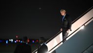 US President Joe Biden steps off Air Force One upon arrival at Joint Base Andrews in Maryland on February 22, 2023.  (Photo by Mandel NGAN / AFP)