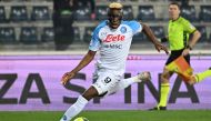 Napoli's Nigerian Victor Osimhen runs with the ball during the Italian Serie A  match between Empoli FC and SSC Napoli at the Stadio comunale Carlo Castellani stadium in Empoli on February 25, 2023. (Photo by Alberto PIZZOLI / AFP)