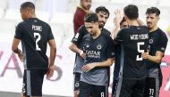 Al Sadd players celebrate after Hassan Al Haydos scored their first goal . 
