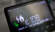 In this file picture taken on February 4, 2022, a smart energy meter, used to monitor gas and electricity use, is pictured in a home in Walthamstow, east London. (Photo by Tolga Akmen / AFP)

