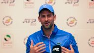 Novak Djokovic of Serbia holds a press conference during the ATP Dubai Duty Free Tennis Championships in Dubai, on February 26, 2023. (Photo by Karim SAHIB / AFP) 