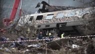 Police and emergency crew search the debris of a crushed wagon after a train accident in the Tempi Valley near Larisa, Greece, March 1, 2023. Photo by Sakis MITROLIDIS / AFP