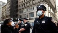 Shouting protesters face NYPD officers during a Black Lives Matter demonstration last summer in New York City, in outrage over the death of a Black man in Minnesota who died after a white policeman knelt on his neck for several minutes. File photo / AFP
