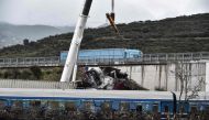 Search operations are underway after a head-on collision of a freight train with a passenger train carrying over 350 people killed dozens of people on February 28, the country's worst-ever rail disaster, in the Tempi Valley near Larissa on March 2, 2023.  (Photo by Sakis MITROLIDIS / AFP)