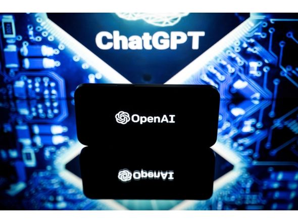 This picture taken on January 23, 2023 in Toulouse, southwestern France, shows screens displaying the logos of OpenAI and ChatGPT. (Photo by Lionel BONAVENTURE / AFP)