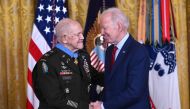 US President Joe Biden awards the Medal of Honor to Vietnam War veteran, Retired US Army Colonel Paris Davis, in the East Room of the White House in Washington, DC, on March 3, 2023. (Photo by Andrew Caballero-Reynolds / AFP)