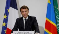France's President Emmanuel Macron delivers a speech during a visit at the National Biomedical Research Institute (NBRI) in Kinshasa on March 4, 2023. - The French President is in Kinshasa on the fourth and last leg of an African tour. (Photo by LUDOVIC MARIN / AFP)