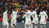 Lille's Canadian forward Jonathan David celebrates with team mates after scoring a goal during the French L1 match between Lens and Lille and the Bollaert-Delelis stadium in Lens on March 4, 2023. (Photo by FRANCOIS LO PRESTI / AFP)
 