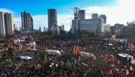 In this file photo taken on January 31, 2023, protesters gather at Place d'Italie square for a rally on a second day of nationwide strikes and protests over the government's proposed pension reform, in Paris. (Photo by Alain JOCARD / AFP)