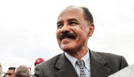 (FILE PHOTO) In this file photo taken on November 09, 2018 Eritrea's President Isaias Afwerki smiles upon his arrival at the airport in Gondar, for a visit in Ethiopia. (Photo by EDUARDO SOTERAS / AFP)