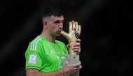 Argentina's Emiliano Martinez after he is awarded the golden glove award during the trophy ceremony of the FIFA World Cup Qatar 2022 at the Lusail Stadium on December 18, 2022. (REUTERS/Hannah Mckay)

