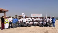 The Oryx Group officials pose for a photograph during the program.