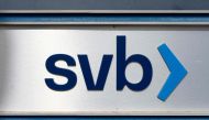 A Silicon Valley Bank logo is seen in Tempe, Arizona, on March 14, 2023. - With hindsight, there were warning signs ahead of last week's spectacular collapse of Silicon Valley Bank, missed not only by investors, but by bank regulators. Just why the oversight failed remained a hot question among banking experts, with some focusing on the weakness of US rules. (Photo by REBECCA NOBLE / AFP)