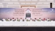 Minister of Commerce and Industry and Chairman of the Board of Directors H E Sheikh Mohamed Bin Hamad Bin Qassim Al Thani with officials of Masraf Al Rayan at the AGM. 