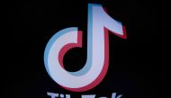 In this file photo taken with a fish-eye lens on March 1, 2023 in Paris shows the social media application logo TikTok. Photo by JOEL SAGET / AFP