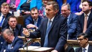 A handout photograph released by the UK Parliament shows Britain's Chancellor of the Exchequer Jeremy Hunt standing at the despatch box making his annual budget statement in the House of Commons in London on March 15, 2023.  (Photo by Andy Bailey / UK PARLIAMENT / AFP)