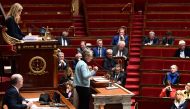 French Prime Minister Elisabeth Borne delivers a speech prior to the vote of two motions of no confidence at the French National Assembly, on March 20, 2023.  (Photo by BERTRAND GUAY / AFP)