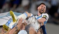 Argentina's forward Lionel Messi is lifted up by teammates during a recognition ceremony for the World Cup winning players, following the friendly football match between Argentina and Panama at the Monumental stadium in Buenos Aires on March 23, 2023. Photo by JUAN MABROMATA / AFP