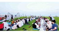 People break their fast during a community Iftar hosted by the AMUAAQ.    