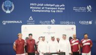 Minister of Transport H E Jassim Saif Ahmed Al Sulaiti; Qatar Airways Group Chief Executive H E Akbar Al Baker; and President of Ashghal and Mowasalat (Karwa) Chairman Dr. Eng Saad bin Ahmad Al Muhannadi pose with the winning team during the second edition of the Minister of Transport Ramadan Padel Championship Cup 2023 at Padel-In Aspire Zone.