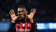 AC Milan's Portuguese forward Rafael Leao celebrates after opening the scoring during the Italian Serie A football match between SSC Napoli and AC Milan on April 2, 2023 at the Diego-Maradona stadium in Naples. (Photo by Tiziana FABI / AFP)