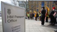 Members of the Public and Commercial Services (PCS) union stand on a picket line on the first day of a five-week strike by UK passport office workers, in London on April 3, 2023. Photo by Susannah Ireland / AFP