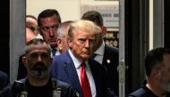 Former US President Donald Trump makes his way inside the Manhattan Criminal Courthouse in New York on April 4, 2023. (Photo by Ed Jones / AFP)