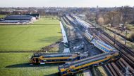 This aerial view shows a derailed night train in Voorschoten on April 4, 2023. Photo by Remko de Waal / ANP / AFP