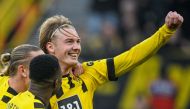In this file photo taken on February 4, 2023 Dortmund's German midfielder Julian Brandt (R) celebrates scoring the 4-1 goal with his teammtes during the German first division Bundesliga football match between Borussia Dortmund v SC Freiburg in Dortmund, western Germany. Photo by SASCHA SCHUERMANN / AFP